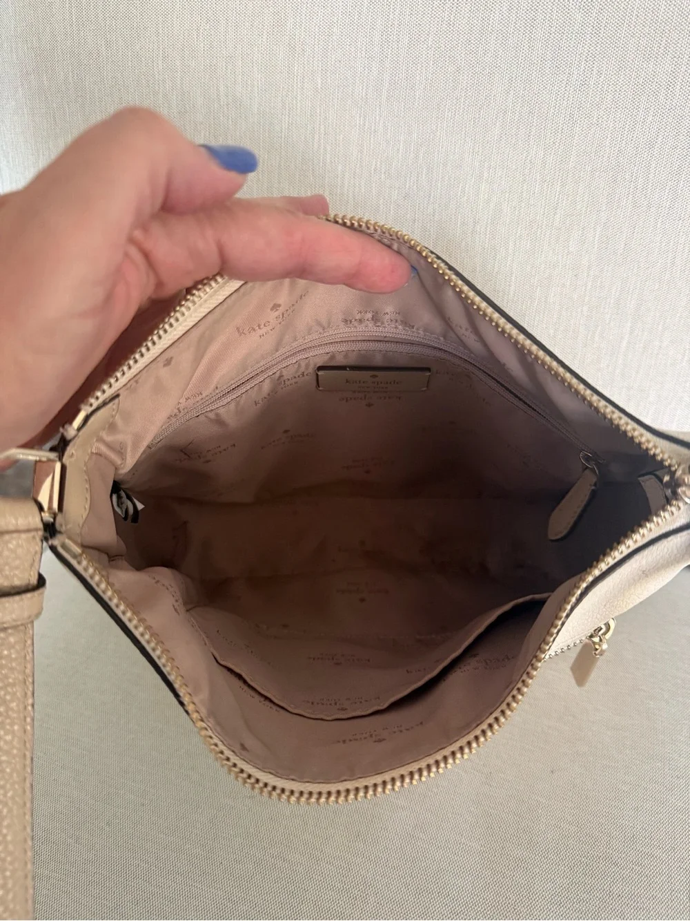 kate spade cream pebbled leather crossbody bag